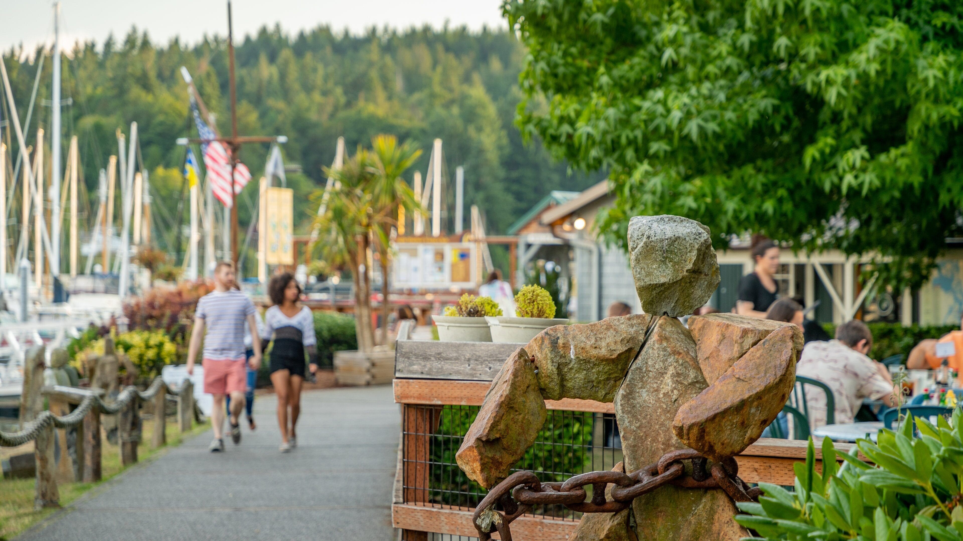 Bainbridge Island showing outdoor art and street scenes as well as a couple