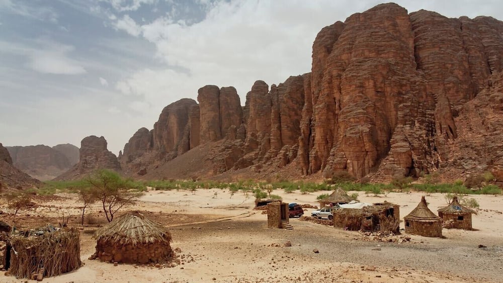 May 2011
Essendilene Canyon, near Djanet, Algeria
In the Saharan dessert in southeast of Algeria there is the Tassili n'Ajer plateau and in one place it has eroded to spikelike sandstone cliffs of a wonderful Essendilene Canyon. This is the dwelling of the local park ranger at the entrance to the canyon.
#unesco