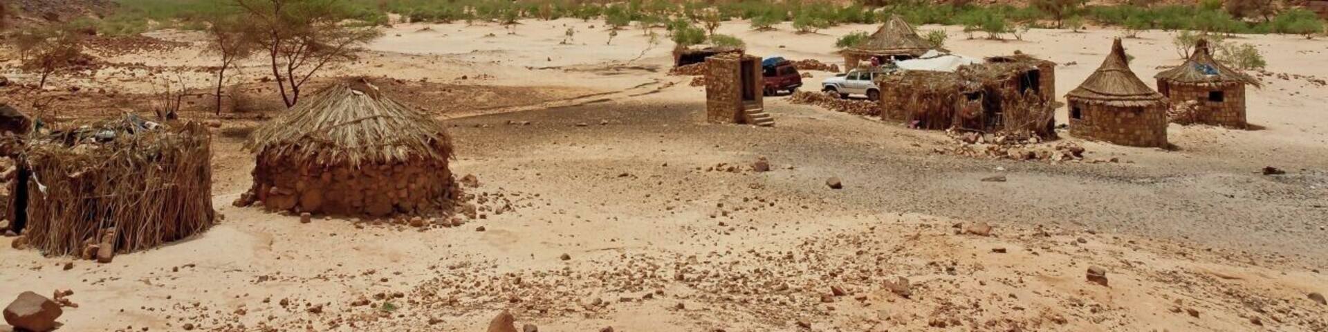 May 2011
Essendilene Canyon, near Djanet, Algeria
In the Saharan dessert in southeast of Algeria there is the Tassili n'Ajer plateau and in one place it has eroded to spikelike sandstone cliffs of a wonderful Essendilene Canyon. This is the dwelling of the local park ranger at the entrance to the canyon.
#unesco
