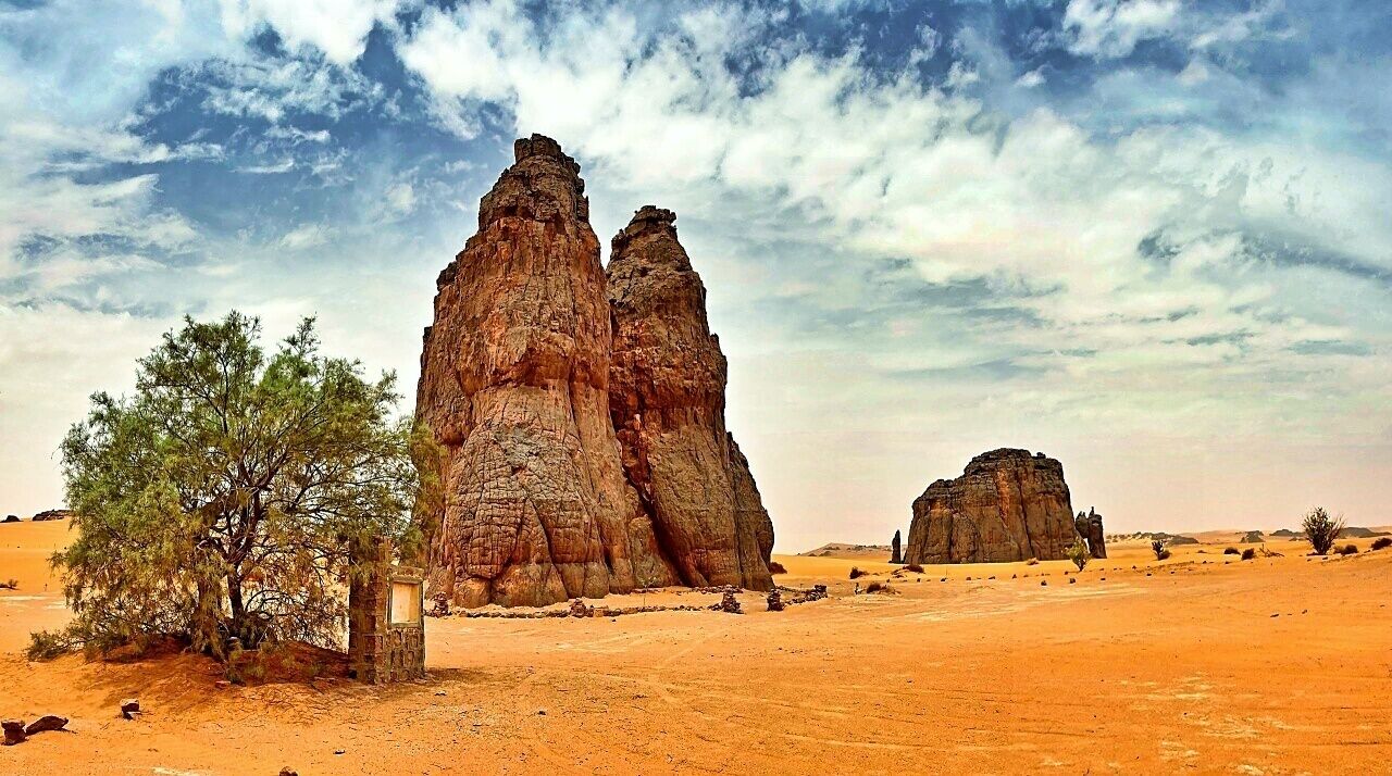 April 2011 
La Vache qui Pleure, Tagharghart, Tassili n'Ajer 

La Vache qui Pleure means The crying cow which is the famous petroglyph or stone basrelief on these wonderful rocks in the desert near Djanet in Tassili n'Ajer. It depicts  cows with tears coming out of their eyes. It is some 5 thousand years old art made by the people living here in times when Sahara was more like a savannah, hovewer already as a mementum of the coming desertification of this land. The legend says that one day the cows were returning to their water reservoir and found out there is no water, so they started to shed their tears... 
A holy place for local Touareg people and a diamond of our world history. 