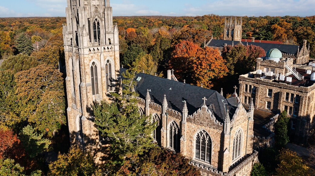 Aerial rear view of the tower, chapel and the Observatory on a mountain top October autumn fall day at the University of the South in Sewanee Tennessee.