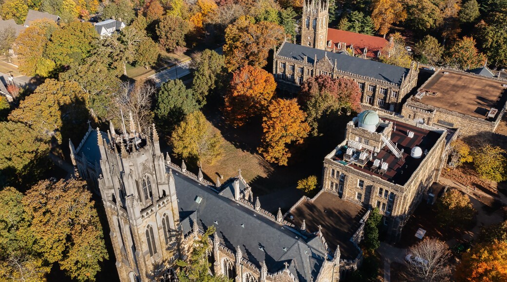 Aerial rear view of the tower, chapel and the Observatory on a mountain top October autumn fall day at the University of the South in Sewanee Tennessee.