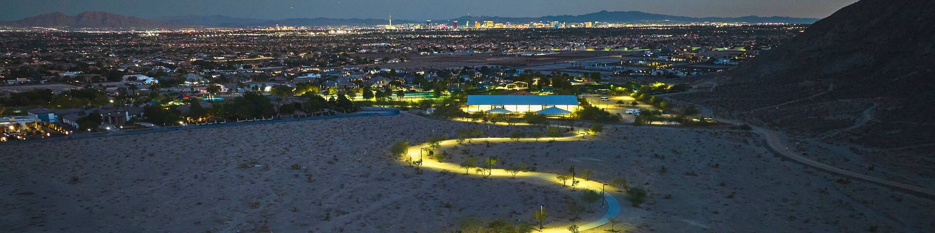 Aerial Lone Mountain Park Walking Path and Las Vegas Skyline at Blue Hour