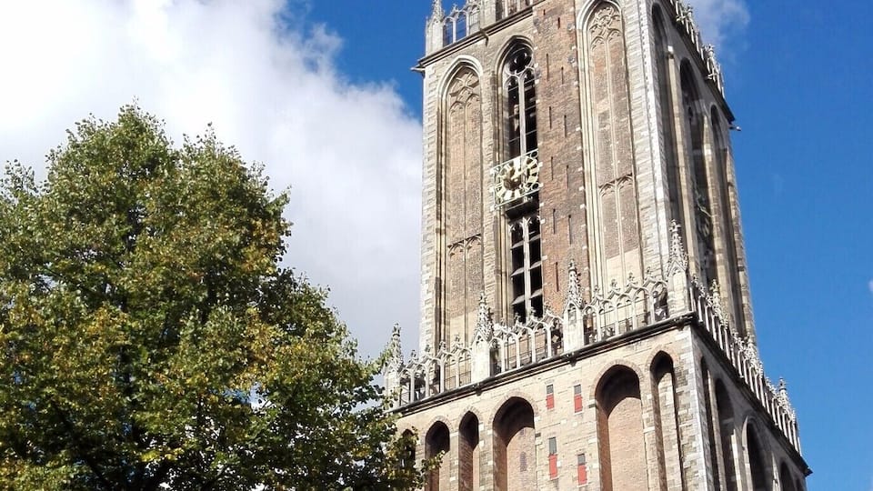 26 Sep 2015
This bell tower is the symbol of the city. Back in the days, it was sticked to the cathedral across the square (Sint Maarten) but a tornado destroyed the unfinished nave, leaving the tower standing apart. If you're a curious person, look at the square's pavement and you'll see the marks of the former pillars.
Note: it is the tallest church tower in the Netherlands, so make sure you climb the 465 steps up!