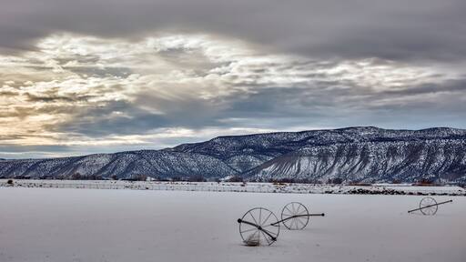 Storm sky over snow field