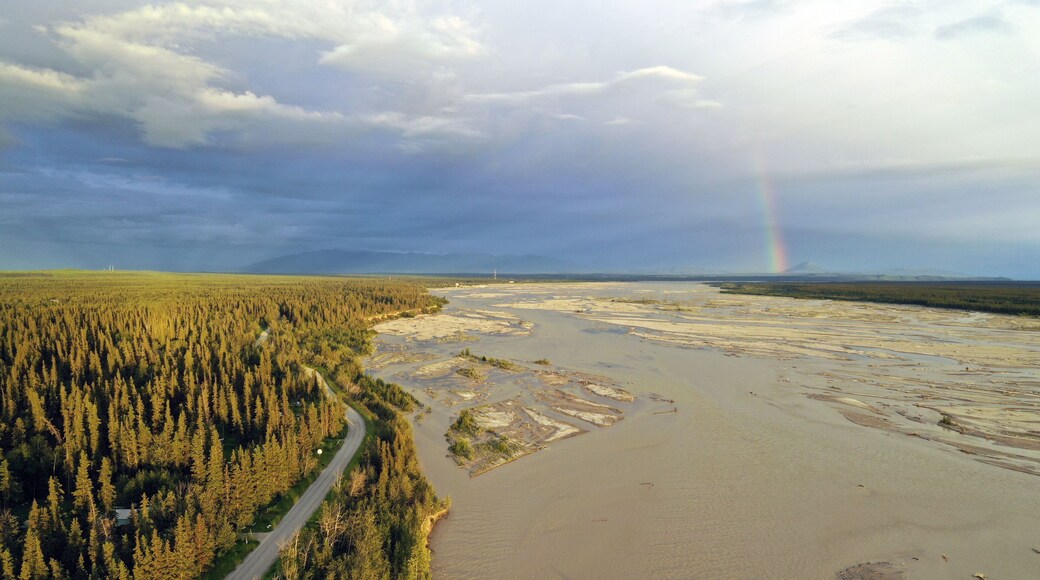The Delta River makes it's way south from Fairbanks Alaska as a Rainbow Appears