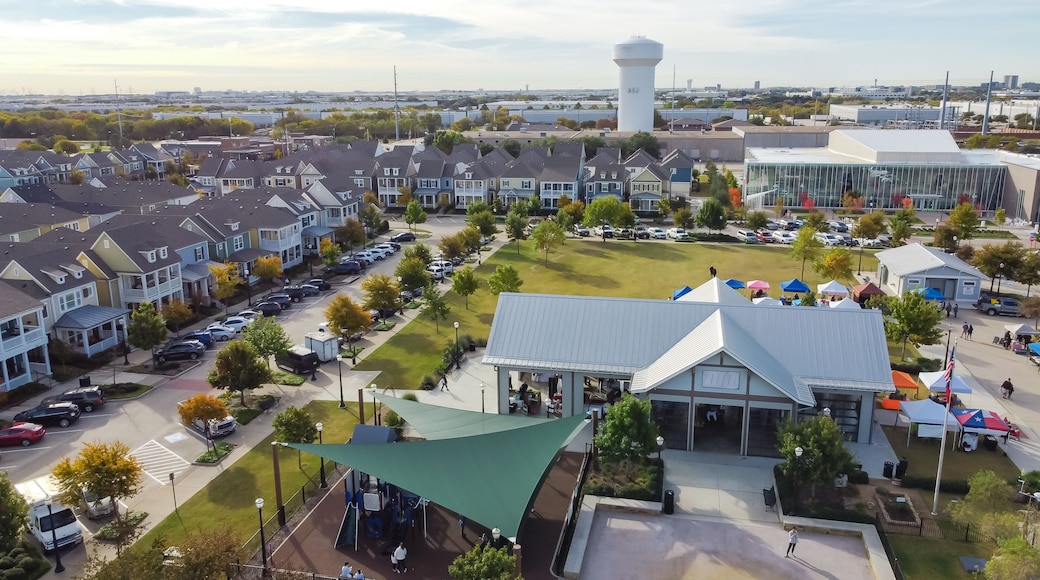 Top view Farmer Market with row of colorful tents and cottage houses at Coppell Downtown, Texas, America