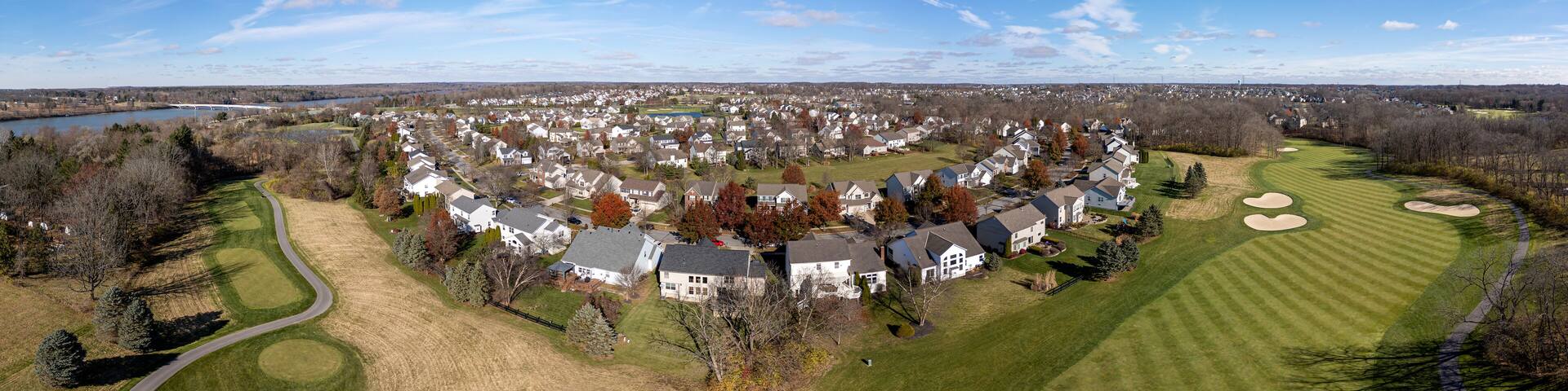 Aerial panoramic view of residential neighborhood and golf course in Powell, Ohio, USA. November 24, 2023.
