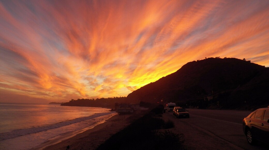 #GoldenHour at Corral Creek Beach in Malibu.
On this evening the sky was truly spectacular, the photo is unedited and doesn't have any filters, but standing there watching this was mesmerizing.
It must be the way the Malibu coastline curves and the light hits it differently than other beaches along LA. For moments of serenity or romance head out to Malibu :)