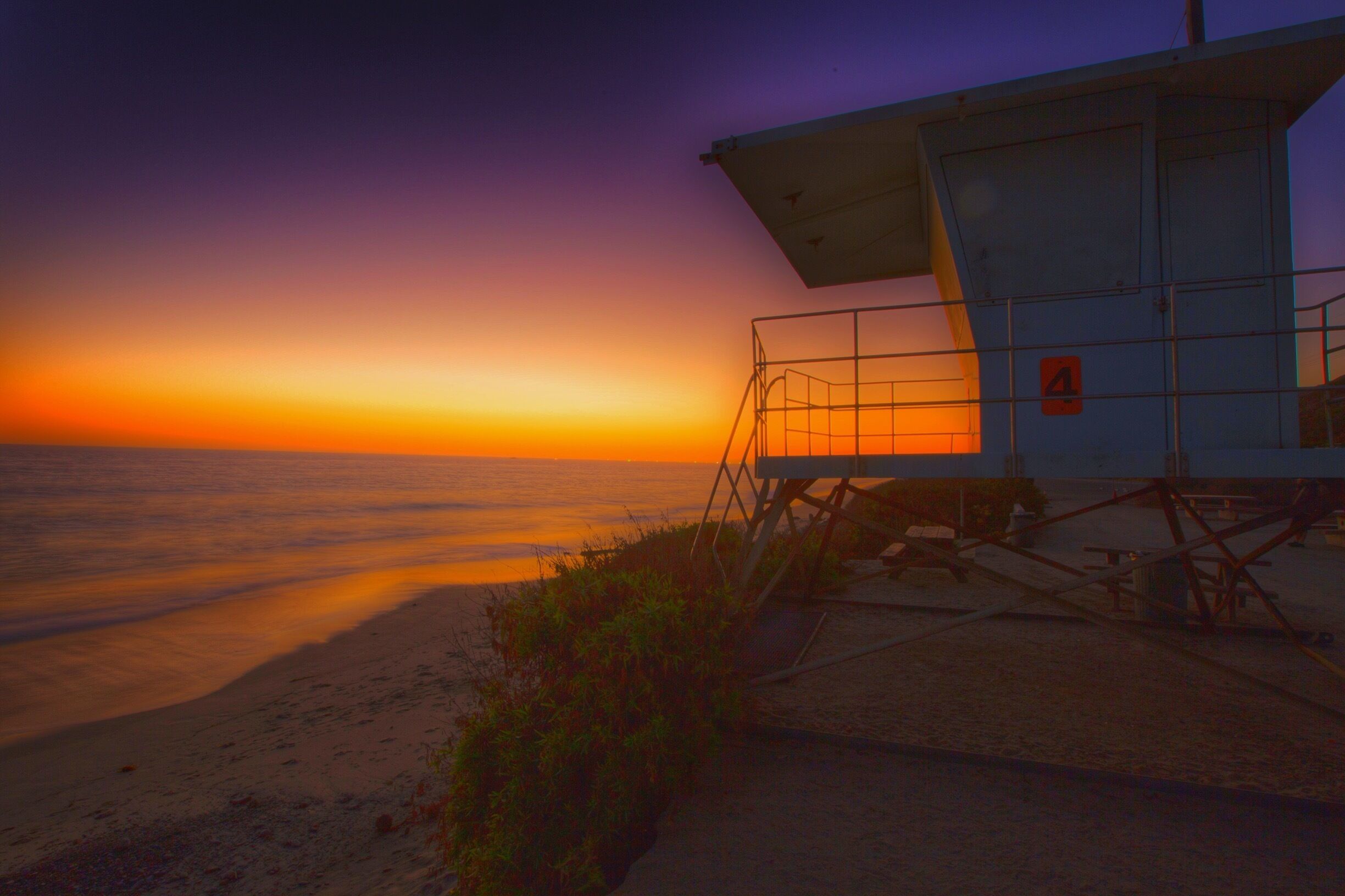 HDR of sunset in Malibu with the life guard tower 