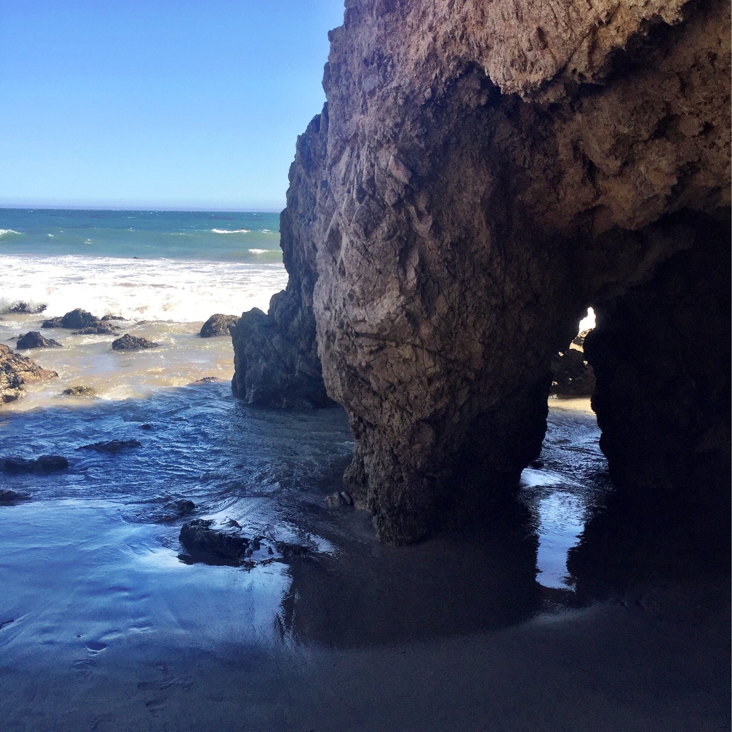Small beach in Malibu, CA. Narrow, kind of steep trail and lots of stairs are worth the views and various wave-worn rock formations when you get to the bottom. 