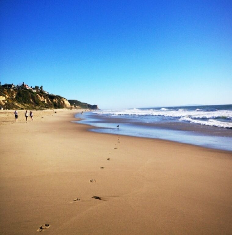 Great place to enjoy some sun, play in the ocean, contemplate the buildings on the edge of the cliff that will collapse someday, and catch a sunset.