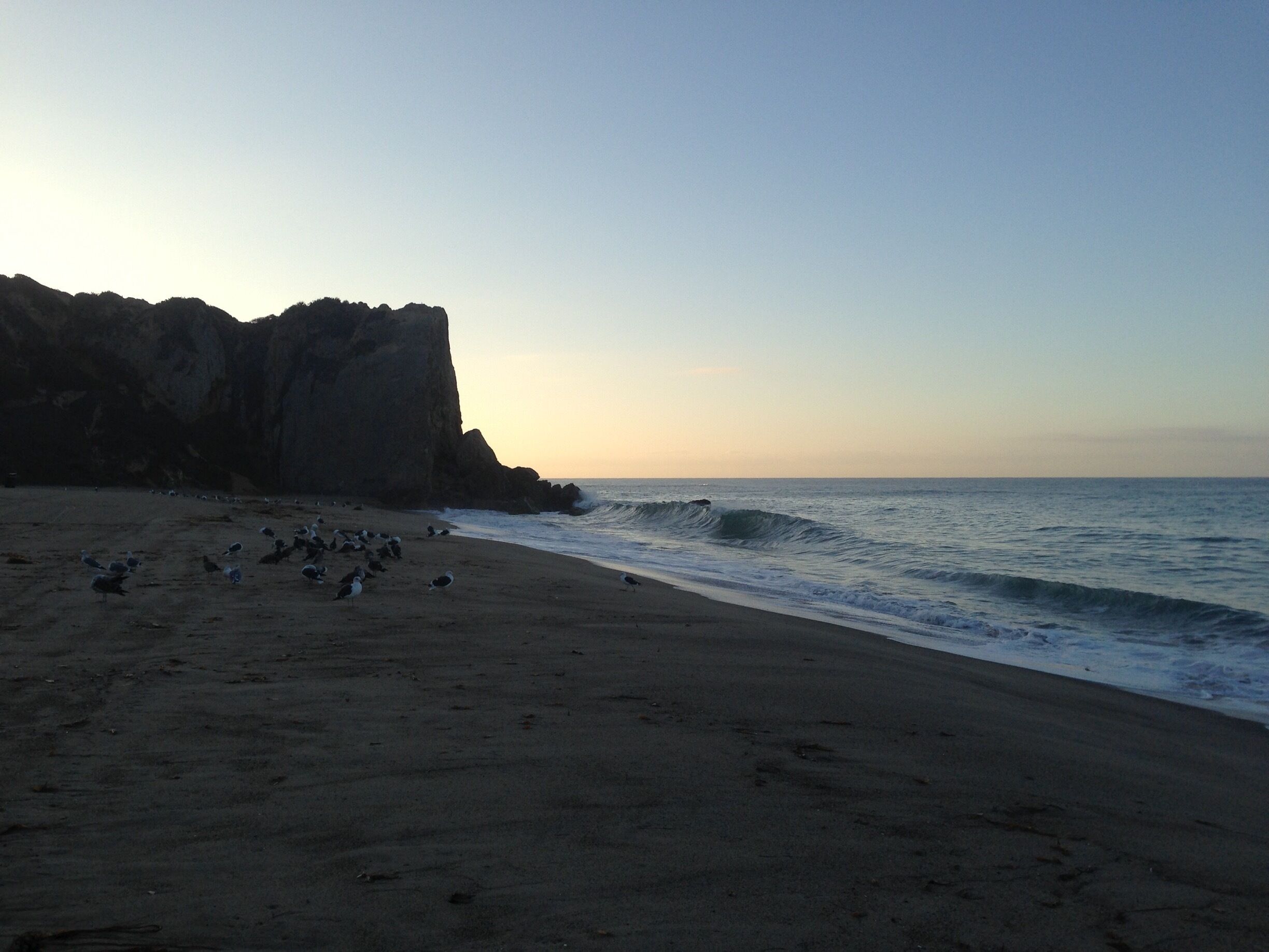 Westward beach is fee for parking or can park on the northern end near sunset cafe and walk half a mile of flat ground or sand.  They have showers and a rock wall for climbing.  Next to Pirate's Cove.  Can walk up to the top of cliff and get an over look.