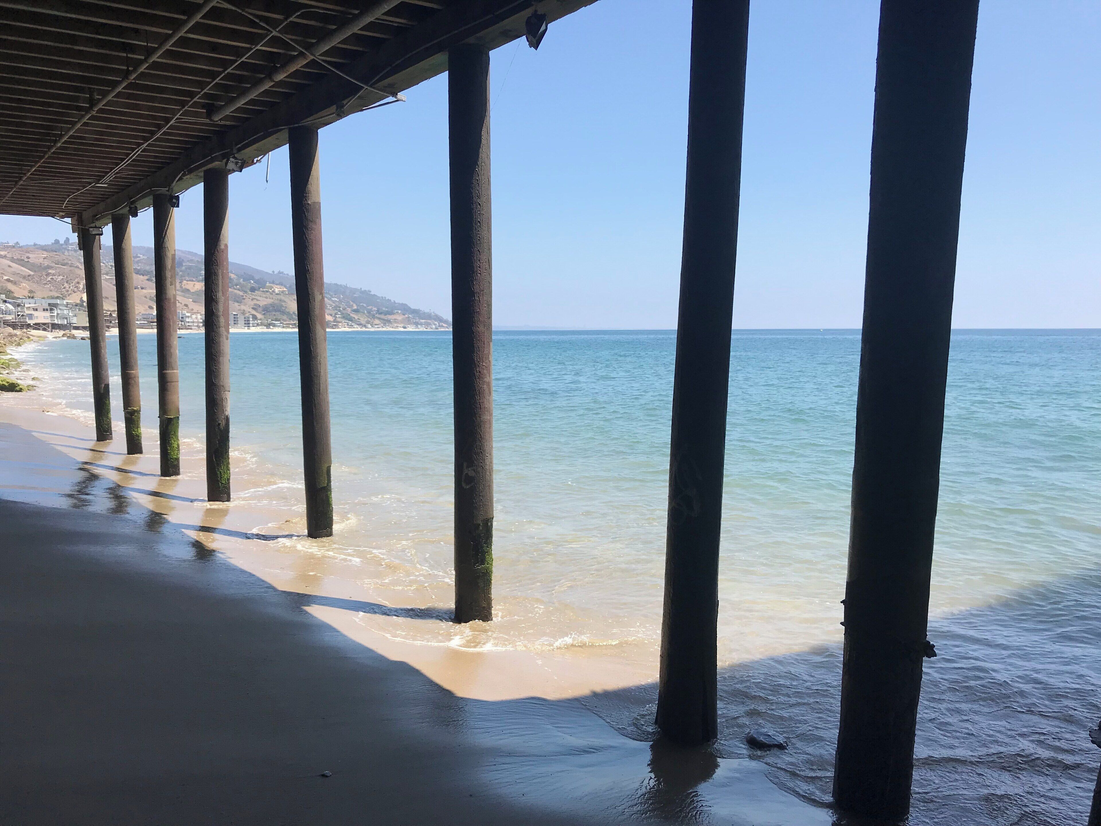 Under the Malibu pier. Love the soft blues of the ocean. #Trovember