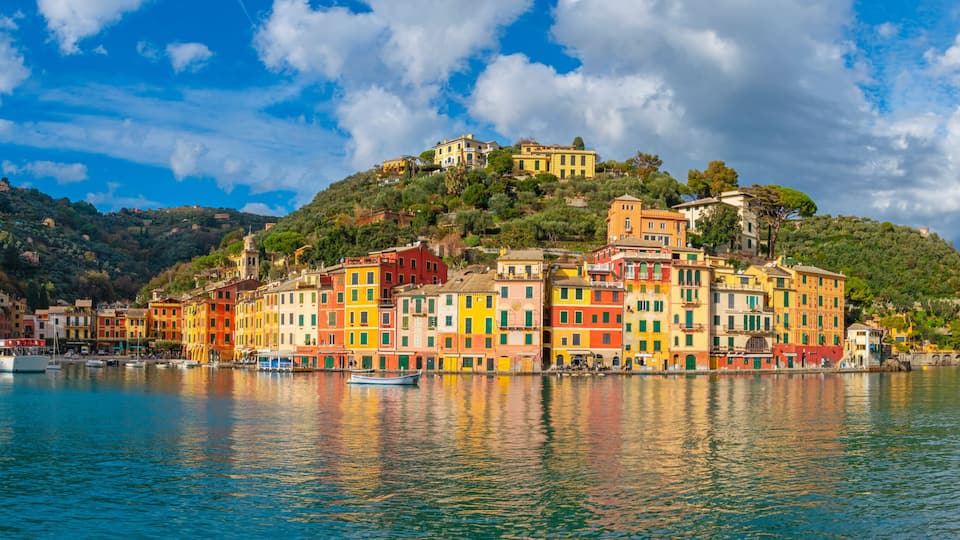 Colorful houses and yachts in spectacular bay harbor of Portofino in the province of Genoa, Italy