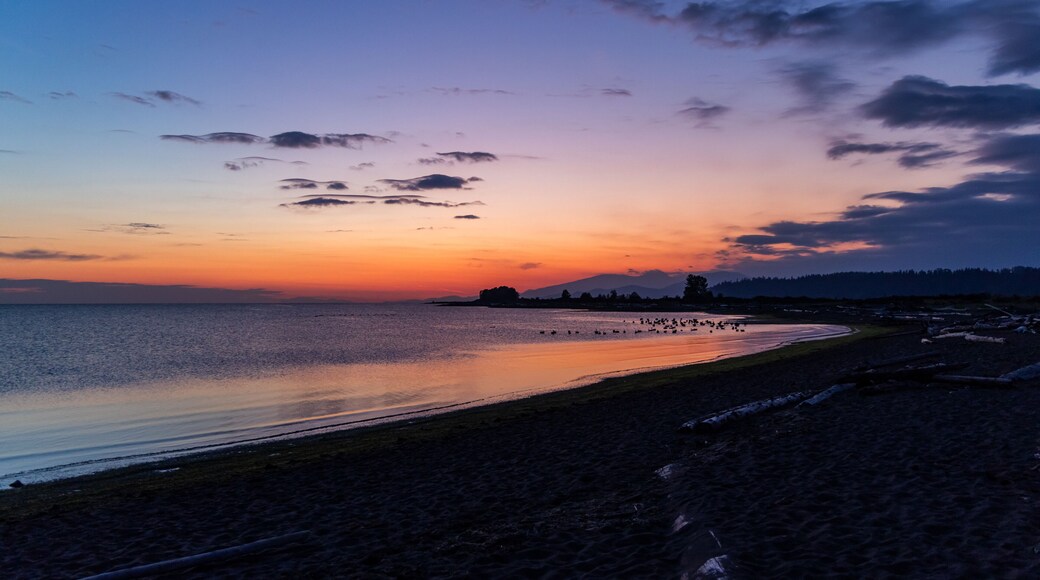 Serene Sunset Over Iona Beach in Greater Vancouver, BC With Distant Hills