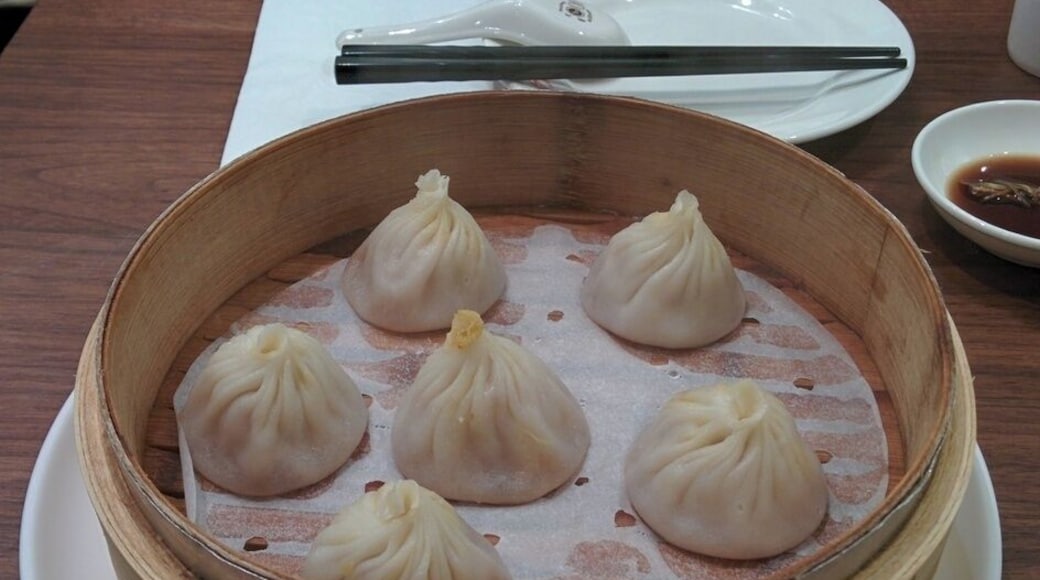 The best Shanghai soup dumplings (xiao long bao) I've had on the west coast was at Dinesty in Richmond, BC. Very soupy underneath. Comparable to Joe's Shanghai in New York. Better than Din Tai Fung in Bellevue, WA.
