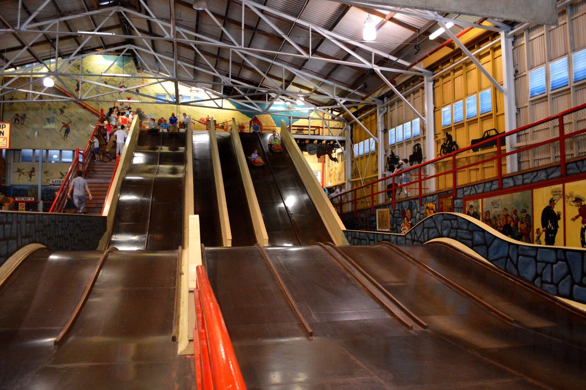 Inside Coney Island... the only ride which everyone can enjoy.  Old style slides (wooden with mats to travel on down)  Under 5 year olds need to be accompanied with an adult.  Has not changed since built.  Very old and run down. 
One of Sydney's great old Icons.  I wrote a piece on my blog '4 pairs of Itchy feet'.  Entry is free and you are able to wonder around.  Either hop off the train at Milsons Point or catch the ferry from any ferry outlet in Sydney.  Fantastic ferry ride and you see some amazing locations along Sydney Harbour (Billion Dollar location).  BUT Don't bother buying the rides passes.  Overpriced!  Even Coney Island (which is old time rides) for AUD10 each person is a waste of money esp if you have little children.  Only 6 rides in the place.  Unlimited but a lot of it does not work very well.  Disappointment!  Go check it out or read my blog for more details.  :)