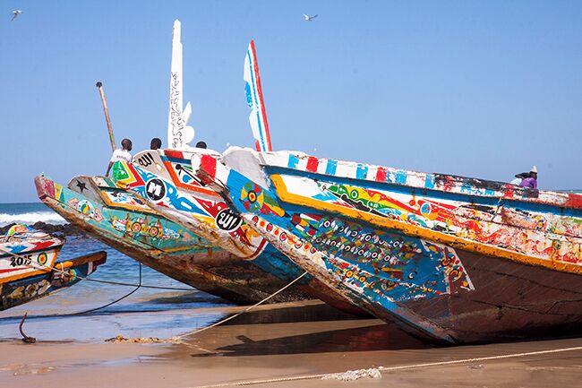 Yoff is a neighborhood in Dakar, but it is also a separate town with its own peculiarities. Yoff is known for its Muslim Community Council and its fishing villages and is considered slightly more conservative than more central parts of Dakar. To get a proper impression of traditional fishing and the beautiful pirogues a visit to the district Yoff is a good idea. Yoff is the most northeastern district of Dakar and adjoins the airport in the west. Read more on blog: http://www.travelwithallsenses.com/fishermen-of-yoff/