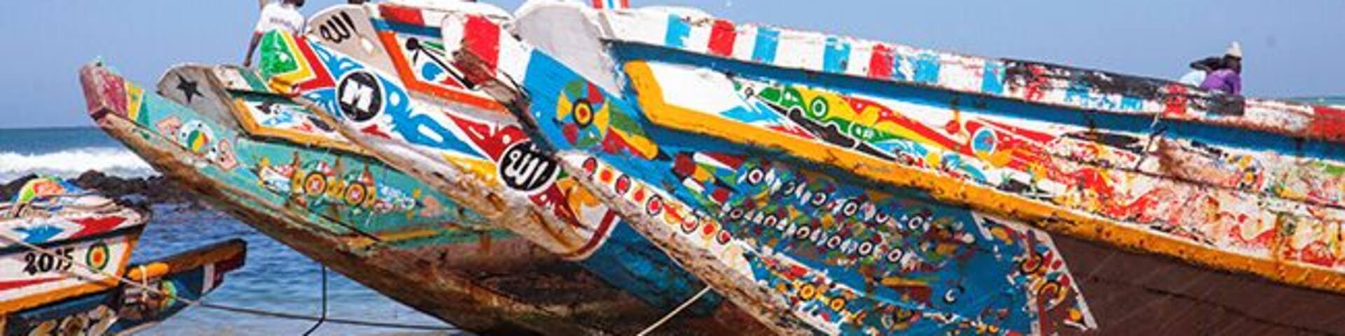 Yoff is a neighborhood in Dakar, but it is also a separate town with its own peculiarities. Yoff is known for its Muslim Community Council and its fishing villages and is considered slightly more conservative than more central parts of Dakar. To get a proper impression of traditional fishing and the beautiful pirogues a visit to the district Yoff is a good idea. Yoff is the most northeastern district of Dakar and adjoins the airport in the west. Read more on blog: http://www.travelwithallsenses.com/fishermen-of-yoff/