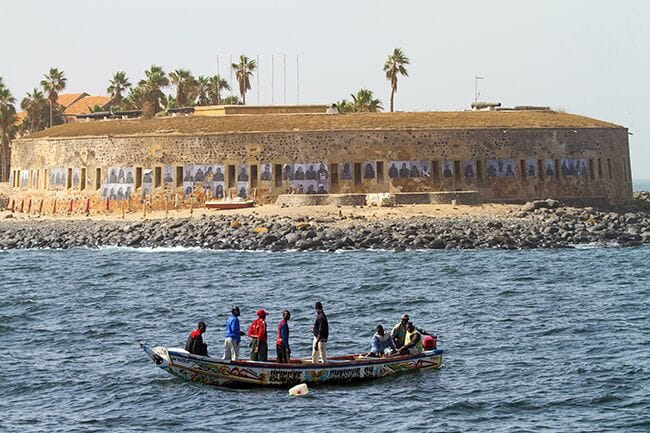 On Goree Island you can learn about Dakar`s dark history while enjoying this little island`s lush and idyllic atmosphere. Only a short ferry ride from Senegal’s capital Dakar lays the tiny island Ile de Gorée. The island is a popular destination for anyone visiting Dakar and Senegal and tells the story of the slave trade across the Atlantic. The entire island was listed on UNESCO World Heritage List in 1978. 
Read more on: http://www.travelwithallsenses.com/goree-island-slave-trade/