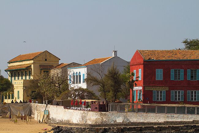On Goree Island you can learn about Dakar`s dark history while enjoying this little island`s lush and idyllic atmosphere. Only a short ferry ride from Senegal’s capital Dakar lays the tiny island Ile de Gorée. The island is a popular destination for anyone visiting Dakar and Senegal and tells the story of the slave trade across the Atlantic. The entire island was listed on UNESCO World Heritage List in 1978. 
Read more on: http://www.travelwithallsenses.com/goree-island-slave-trade/