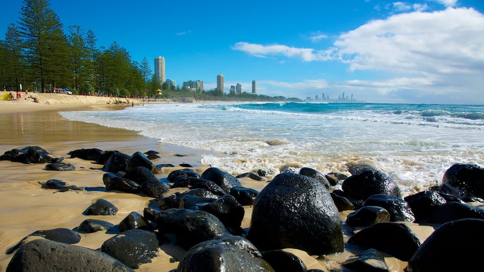 Burleigh Heads which includes a beach, rugged coastline and general coastal views