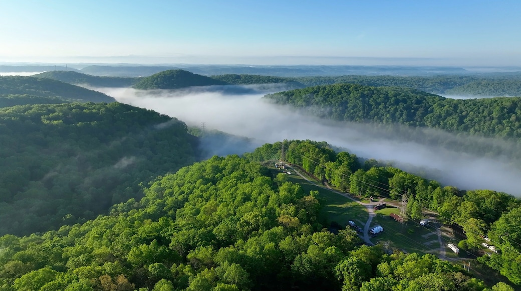 Camping in Tennessee green mountains at Norris Dam near Rocky top with morning misty clouds and sunlight