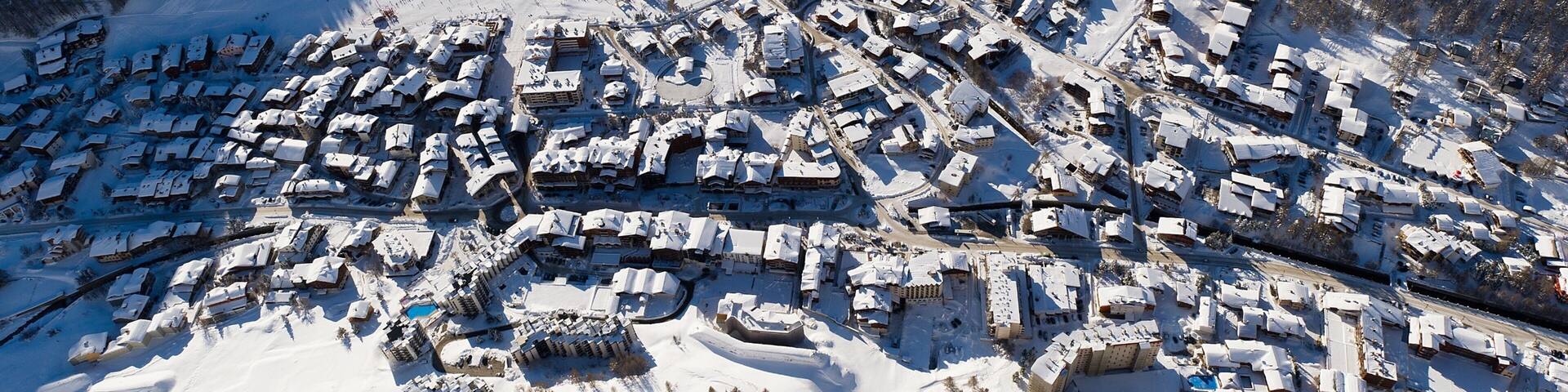 Val-d\'Isere featuring snow and a small town or village