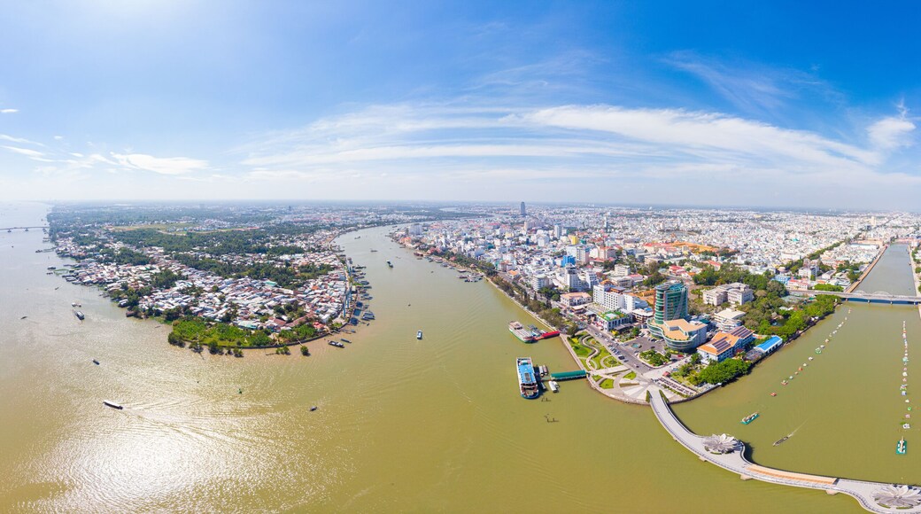 Aerial view Can Tho city skyline from above, Mekong river delta, South Vietnam. Famous tourism destination floating markets. Clear blue sky.