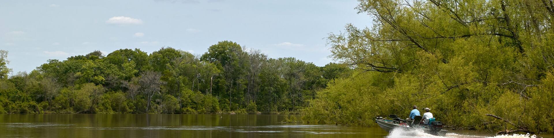 Motorboat with fishermen on Altamaha River, USA