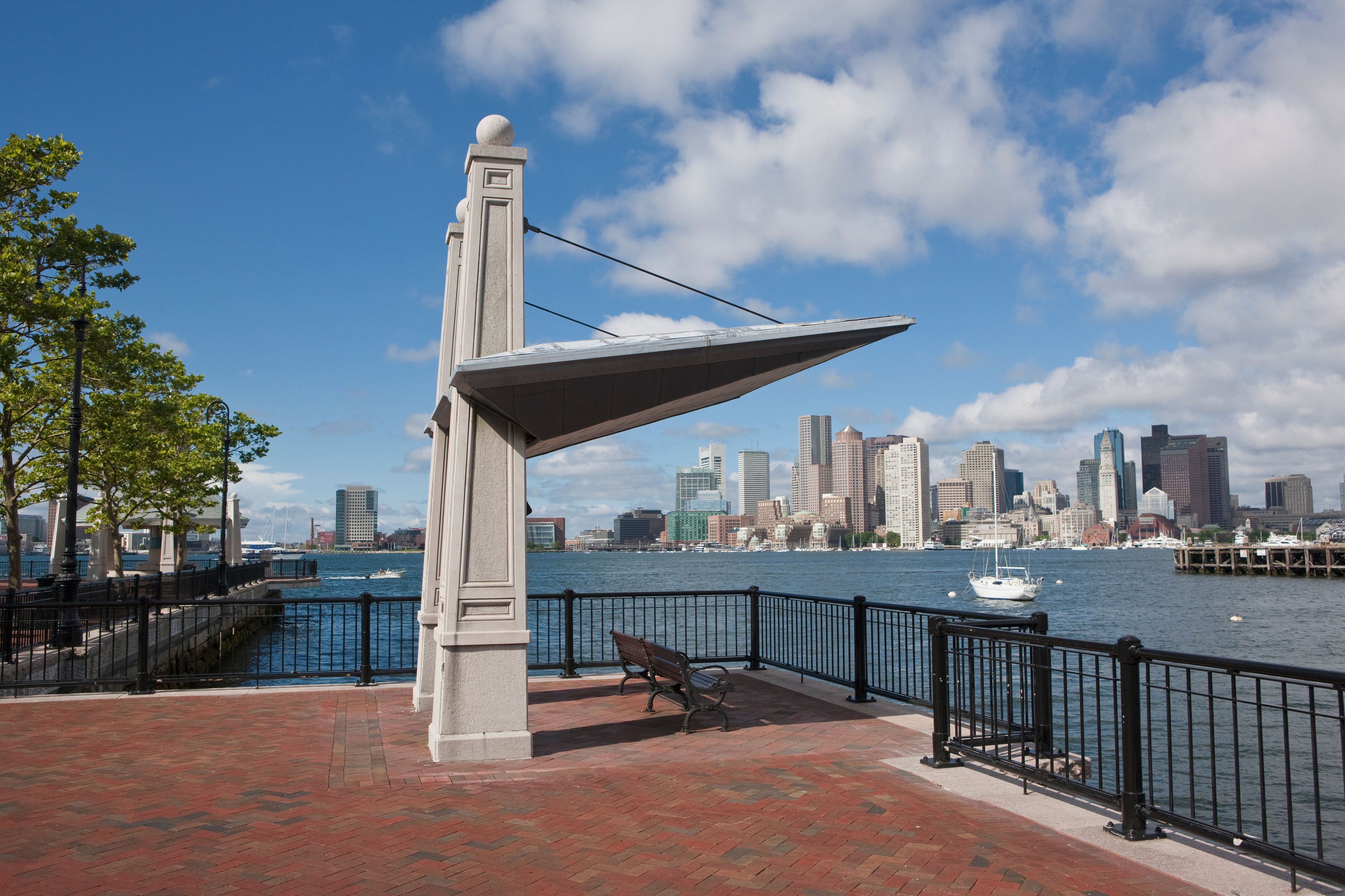 Sculpture at a harbor with city in the background, Boston Harbor, East Boston
