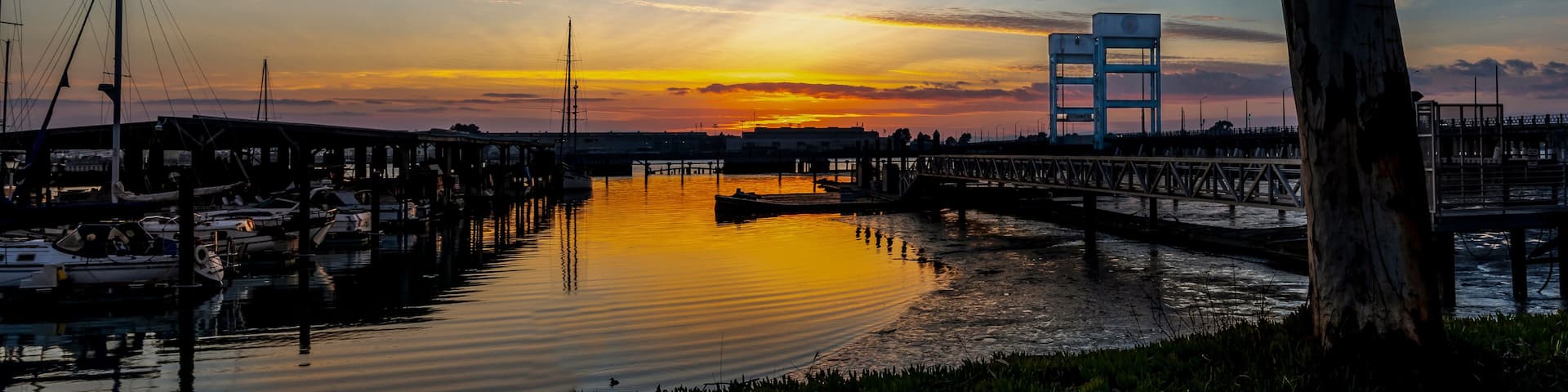 View of a beautiful sunset in the background of Mare Island seen from the Vallejo, Ca. marina