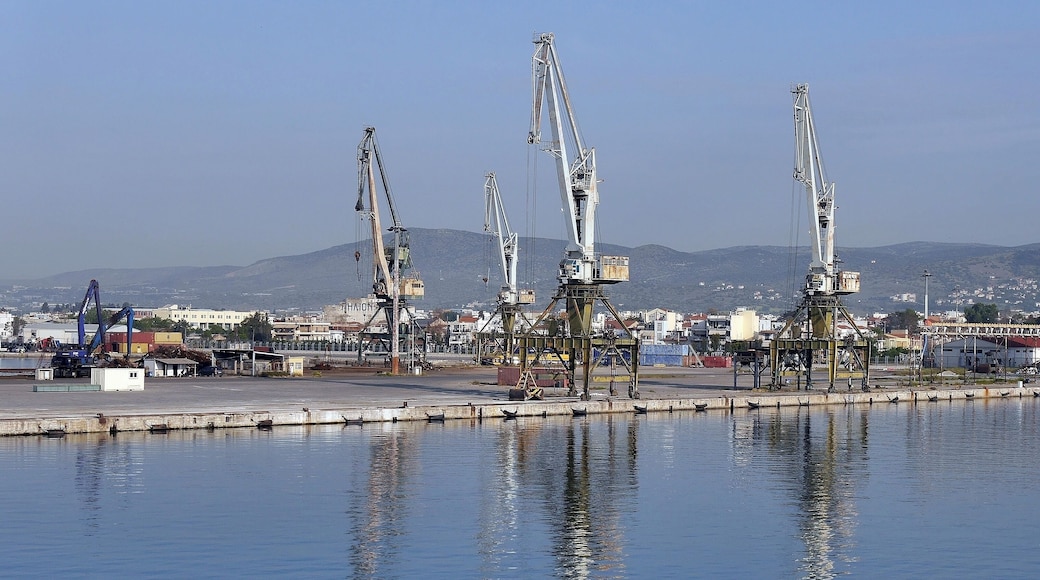 Idle cranes at the working port of Volos. Volos is wonderfully situated as the gateway to the Pelion region of Greece with its stunning countryside and beautiful hillside villages.
It is a bustling, busy city with a large fishing harbour as well as the working port.
And it serves as the base for ferries travelling to the nearby Sporades islands.