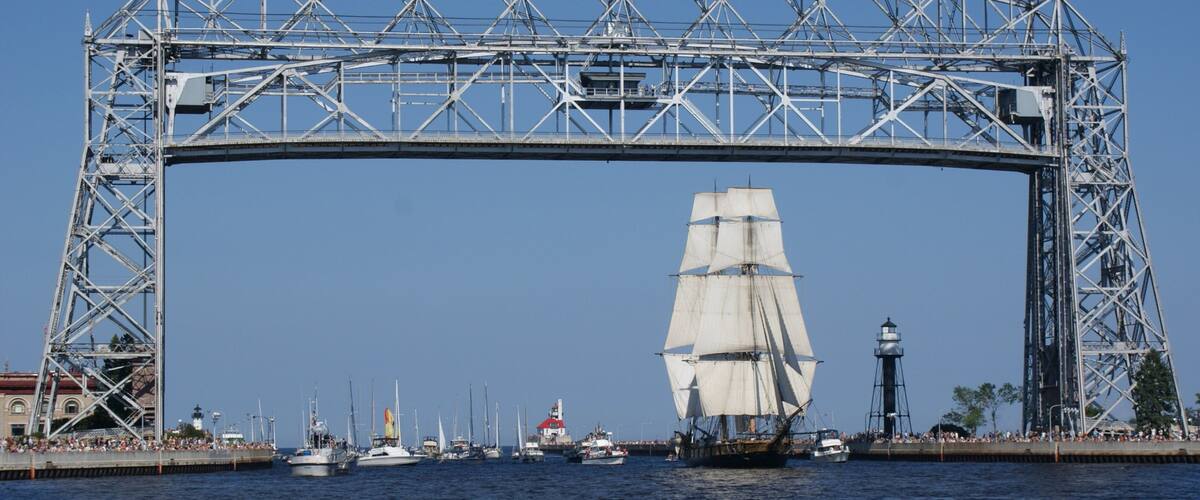 Duluth featuring a bridge, a bay or harbor and modern architecture