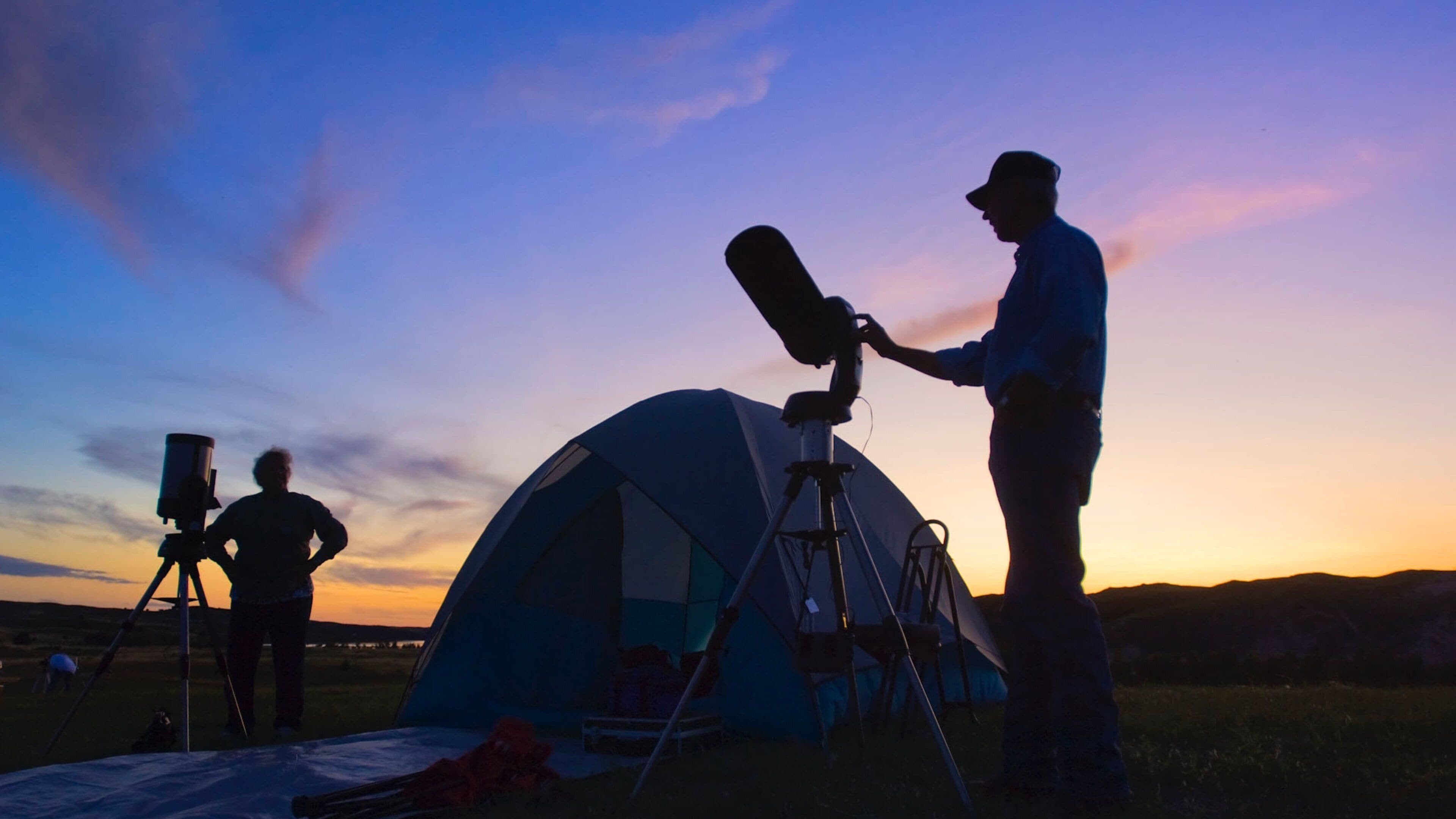 Valentine which includes camping and a sunset as well as a couple