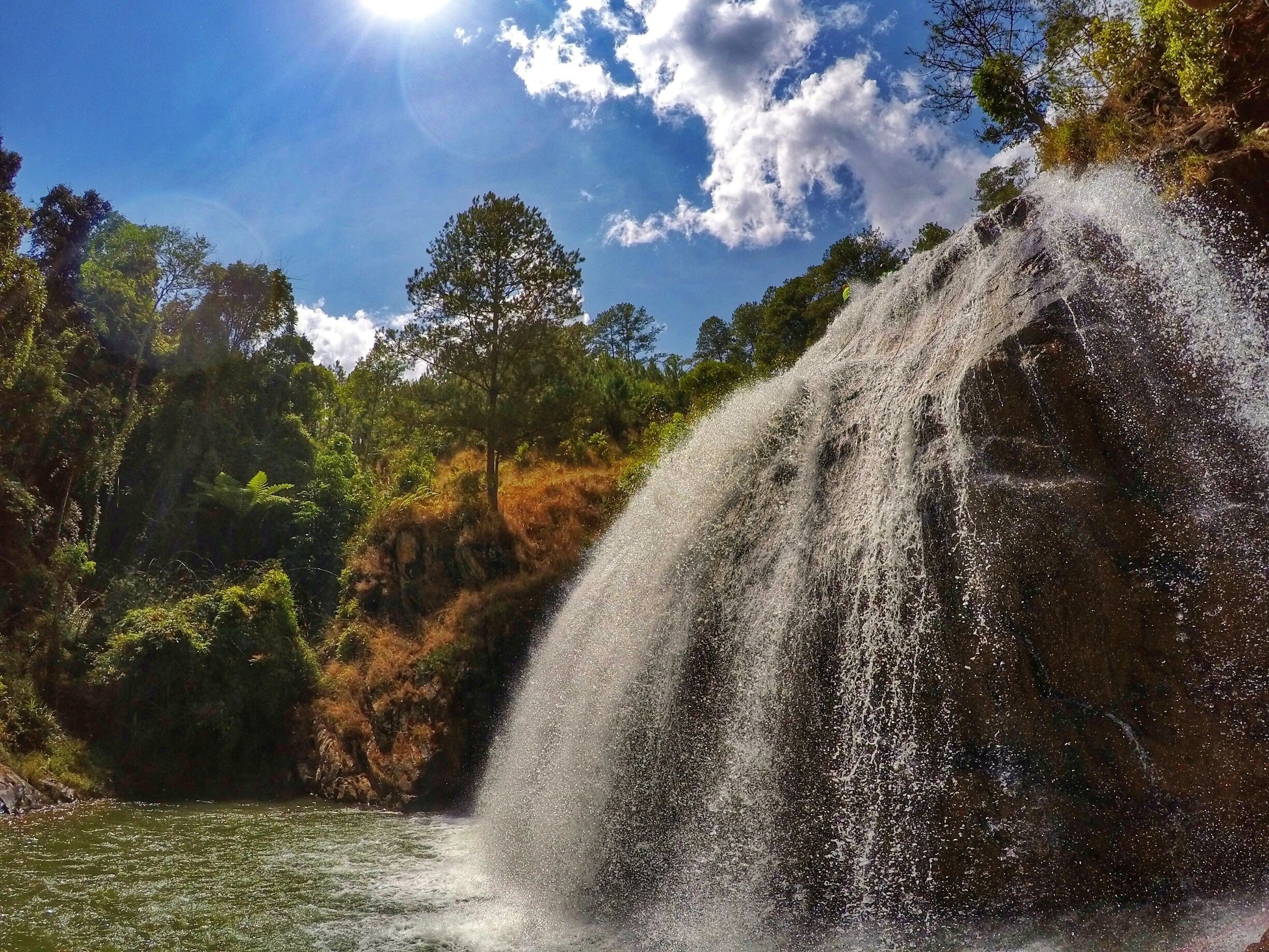 Canyoning in Da Lat - abseiling down this waterfall with a 5m drop at the end 