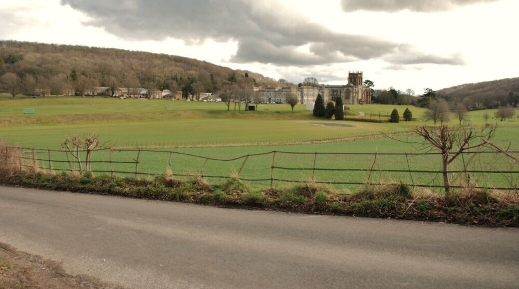 Hilton to Milton Abbas: Road The road passes through farm land and alongside Milton Abbey School seen in the distance.