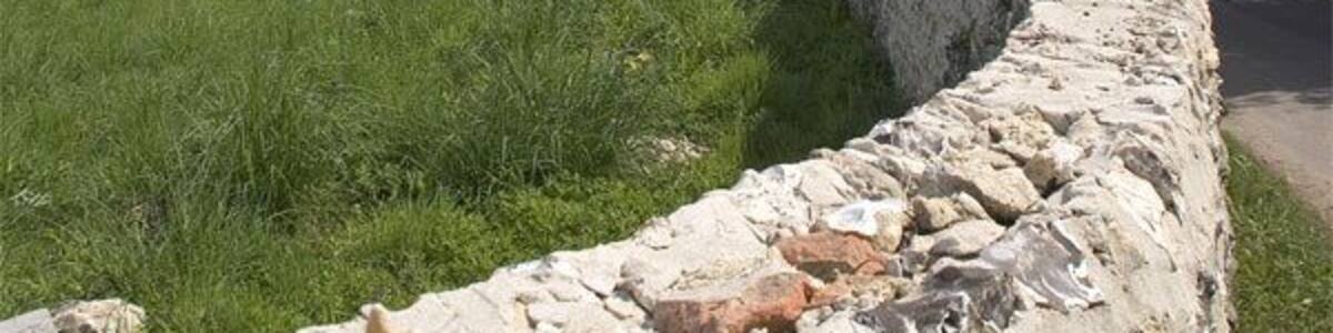 Circular thatched barn at Winterborne Whitechurch The barn is in a field opposite West Farm House. The River Winterborne flows by the road at the bend ahead and the area is liable to flood in winter