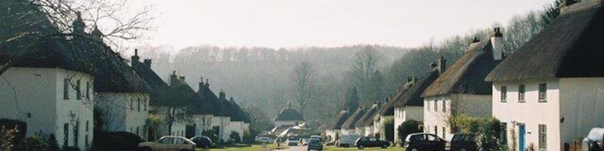 Milton Abbas: picture-postcard village The village was originally a kilometre or so to the west, but was rebuilt in 1780 when the owner of Milton House, Joseph Damer, decided he would rather have a view of a lake than a village!