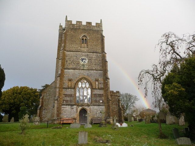SS Mary and James parish church, Hazelbury Bryan, Dorset, seen from the southwest with a rainbow in the background