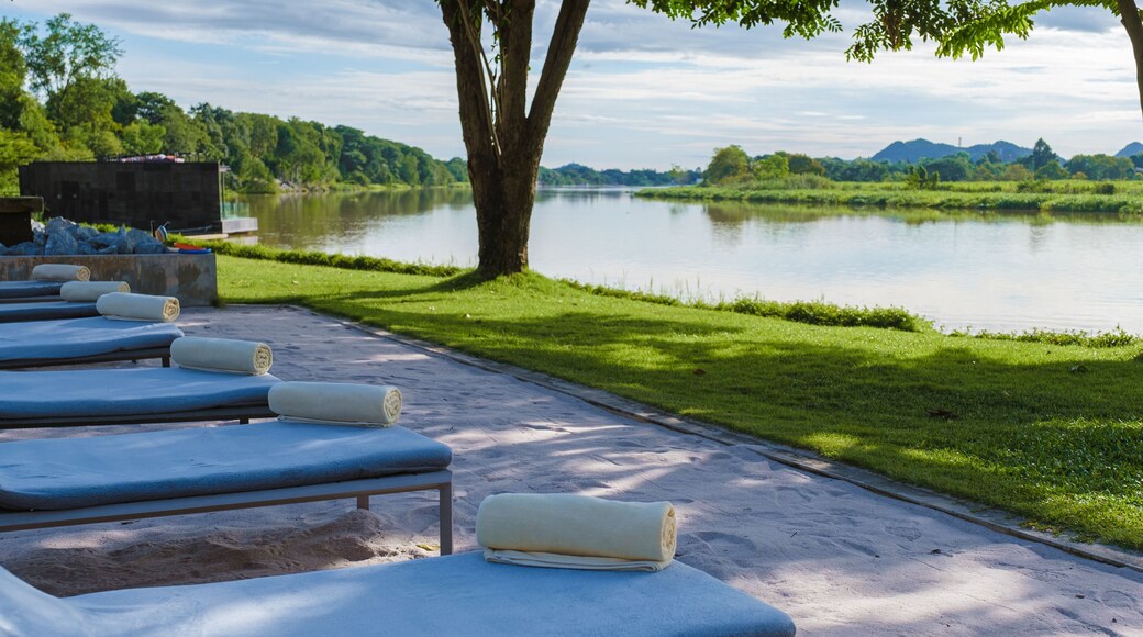 Luxury swimming pool by the River Kwai in Thailand. The pool at the river side of the River Kwai Kanchanaburi