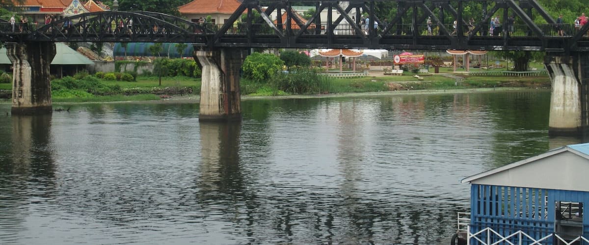 A sad but historically great trip to the infamous death railway built by prisoners for the Japanese . Although not the real bridge you can ride the train from out in the jungle over the bridge  visit the cemetery and the museum .
please don't get photos with any animals there all drugged by there captures .