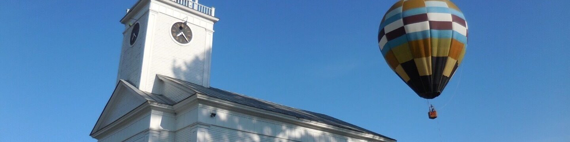Watching this scene my mind went on flights of fancy. Imagine, you are looking at a typical New England Church from the 18th century, while in the backdrop watching a more modern version of an 18th century flight technology!