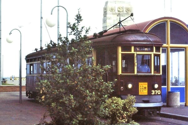 Glenelg tram stop at the end of the line from Adelaide (1986 photo) + Pioneer Memorial