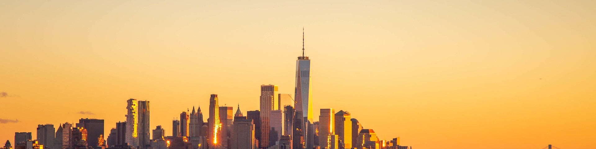 Weehawken which includes a city, landscape views and a sunset