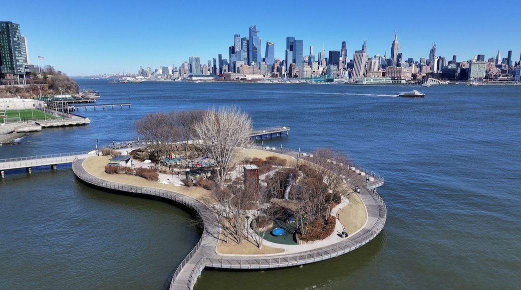 Hudson River Walkway At Jersey City In New Jersey United States. Downtown District. New York Skyline Scene. Hudson River Walkway At New Jersey United States. Walkway Landscape.
