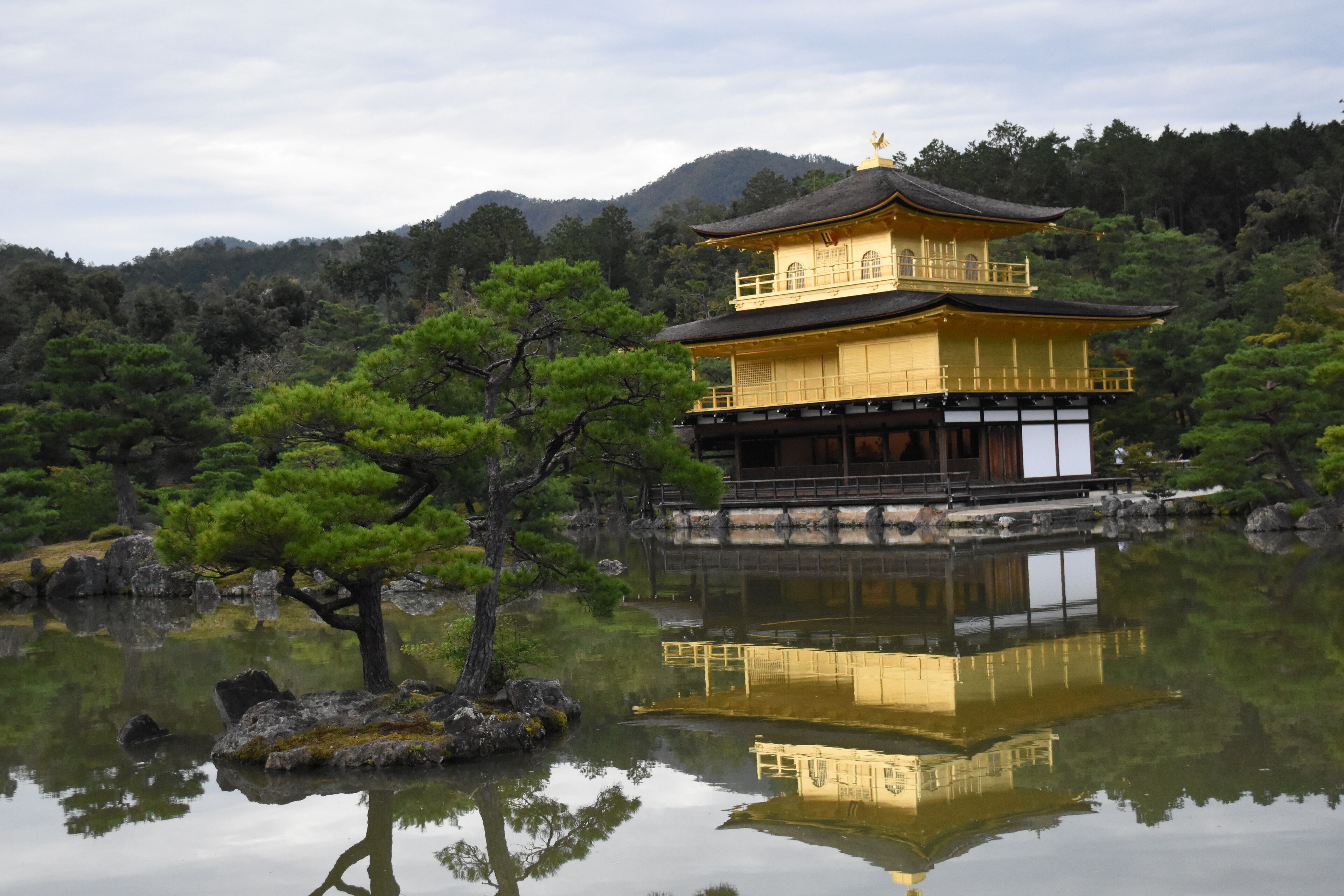 scenery of Kinkakuji.

It is one of the most popular buildings in Japan, attracting a large number of visitors annually.
It is designated as a National Special Historic Site, a National Special Landscape and is one of 17 locations making up the Historic Monuments of Ancient Kyoto which are World Heritage Sites.