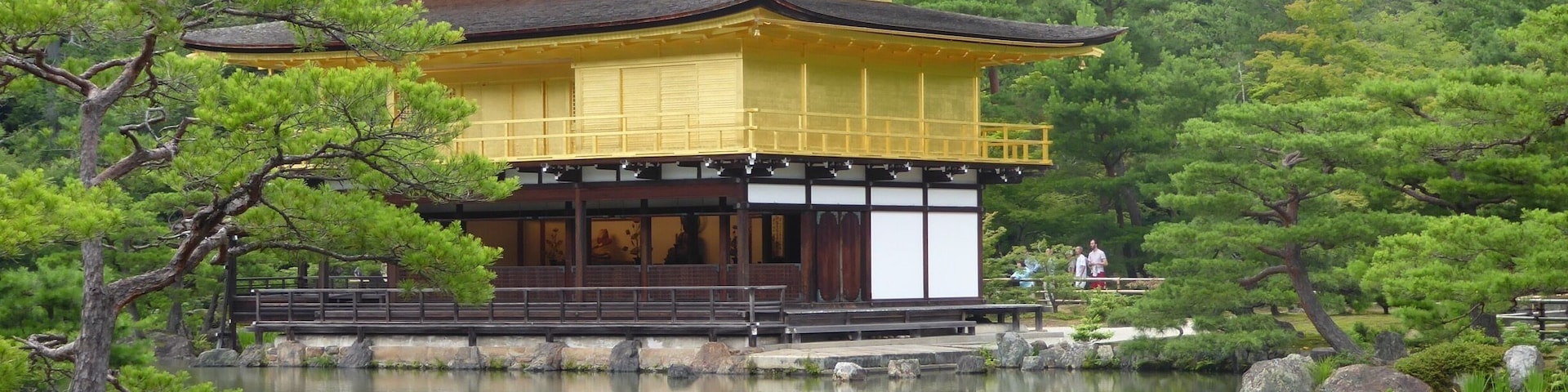 Kinkakuji (ééŁćŻș, Golden Pavilion) is a Zen temple in northern Kyoto whose top two floors are completely covered in gold leaf.