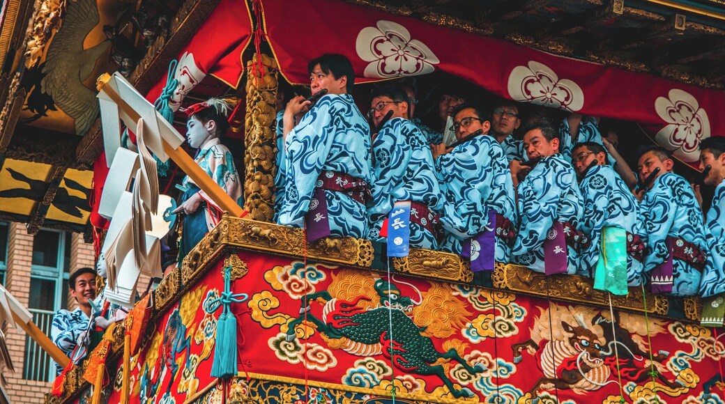 The Gion Matsuri Festival is Japans most famous festival. Musicians sit in huge floats that are pushed/dragged around town in Kyoto while the musicians play their flutes. There are two types of floats in The Gion Matsuri Parade, Yama and Hoko. There are 23 Yama and 10 Hoko. The Hoko floats can be up to 25 meters tall and weigh up to 12 tons.
The main procession of the floats are held on the 17th of July, which is when this photo was taken. #Festival